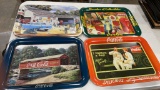4 metal Coca-Cola serving trays