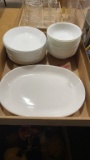 Box of white Corelle dishes