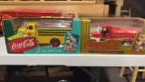 2 New Coca-Cola die cast metal banks