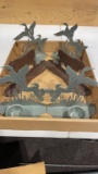 Box of metal cut-out bookends