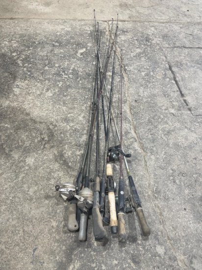 Lot of fishing poles & reels
