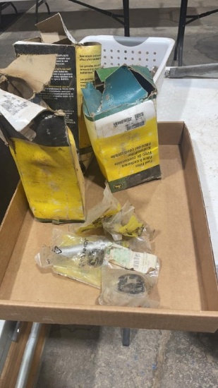 Box of John Deere filters & parts