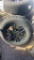 New set of 4 ford rims w/ 255/65R17 Tires