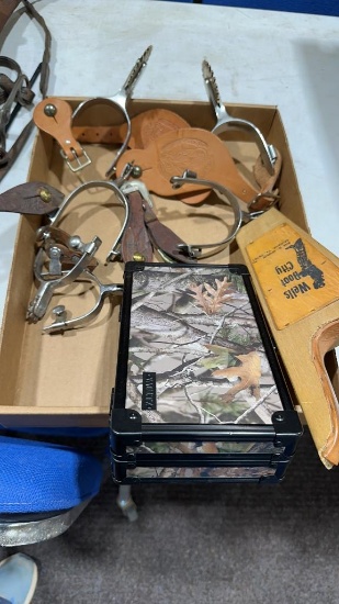 3 pair of spurs, boot jack & camo box
