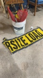 Bucket of oversize load flags & banners