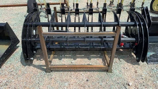 Skid steer curved log grabber