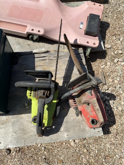 2 chainsaws