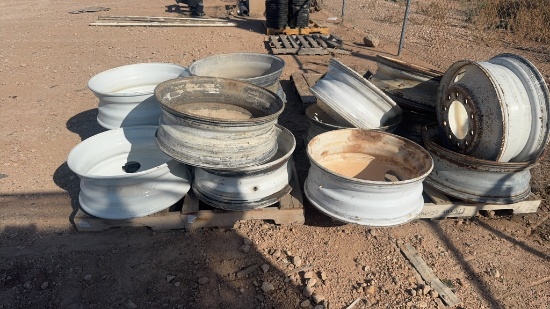 Lot of 14 truck wheels.