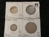 Panama 1967 5 centesimis Proof, New Zealand 1940 penny, Hong Kong 1935 10 cents, and Spain 1878 5 ce