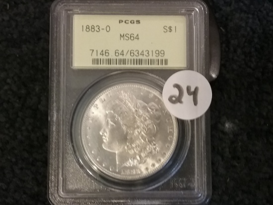 PCGS 1883-O Morgan Dollar in MS-64 (old holder)