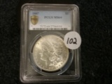 PCGS 1887 $1 Morgan Dollar in MS-64