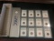 Twelve (12) slabbed coins in a grey/silver NGC box
