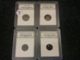 Four slabbed coins