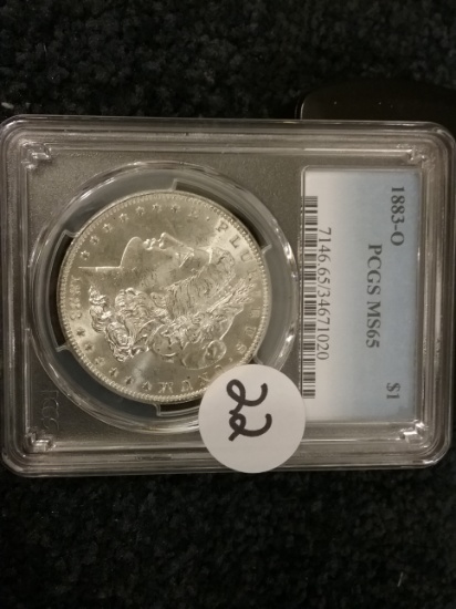 PCGS 1883-O Morgan Dollar in MS-65