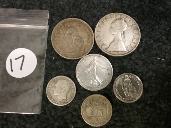 Six foreign silver coins