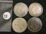 Four Silver Dollars
