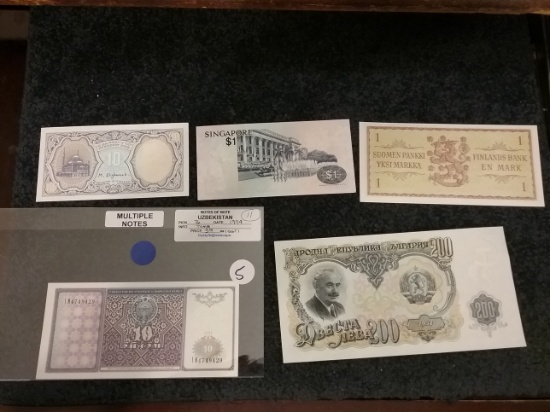 Five foreign currency notes…all uncirculated