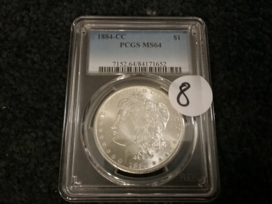 PCGS 1884-CC Morgan Dollar in MS-64