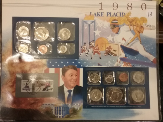 Three uncirculated mint sets with history cards and uncirculated stamps