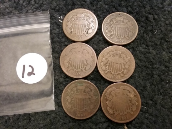 Six (6) two-cent pieces