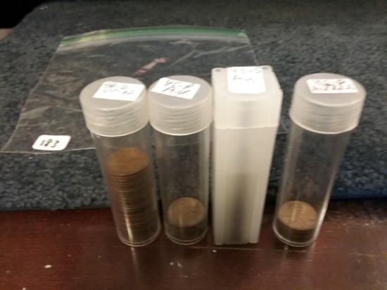 Four partial rolls of wheat cents