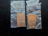 Two one-ounce copper bars