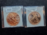 Two one-ounce copper rounds