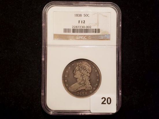 NGC 1838 Reeded Edge Half Dollar in Fine 12