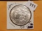 1890-S Morgan Dollar in AU