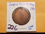 Vintage token with the Empire State Building on one side