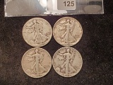 Group of four silver Walking Liberty Half-Dollars