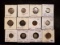 Twelve British coins, five are silver