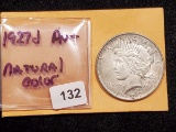 1927-D Peace Dollar in About Uncirculated Plus