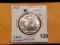 1945 Walking Liberty Half Dollar in About Uncirculated 58