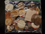 Big bag of tokens and medals