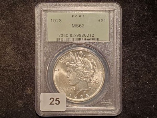 Old Green PCGS Holder with a 1923 Peace Dollar in MS-62