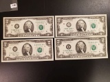 Four Crisp, low serialized Two dollar Star Replacement notes