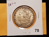 1887-O Morgan Dollar in About Uncirculated