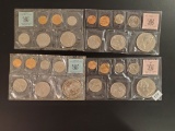 Four Uncirculated coin sets from New Zealand