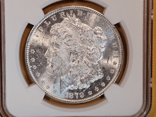 NGC 1879-O Morgan dollar in Mint State 61