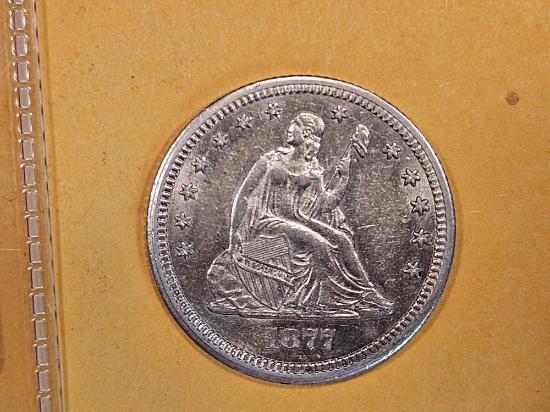 * NICE! 1877-CC Seated Liberty Quarter in Brilliant About Uncirculated - 58