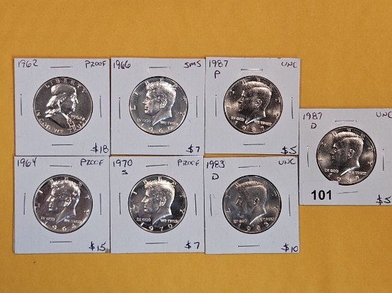 Mix of seven Proof, Clad, Silver, and GEM BU Half Dollars