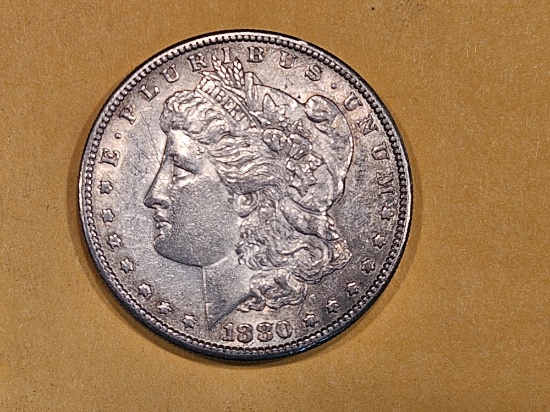 1880-S Morgan Dollar in About Uncirculated plus