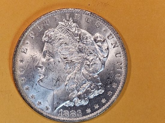 1883-O Morgan Dollar in Choice Brilliant Uncirculated plus