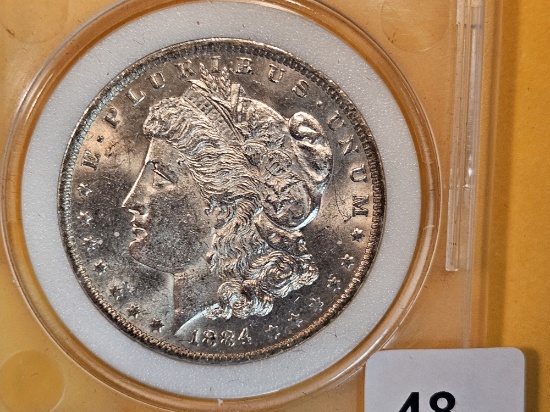 PNC 1884-O Morgan Dollar in MS-66