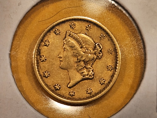 GOLD! 1854 Gold Dollar in About uncirculated plus