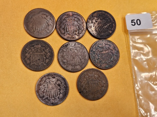 Group of eight 2-cent pieces