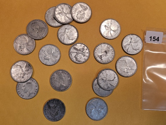 Nineteen Silver Canadian 25 cent pieces