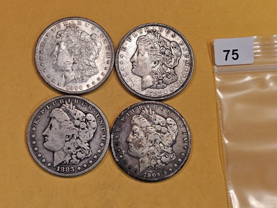Four mixed Morgan Silver Dollars