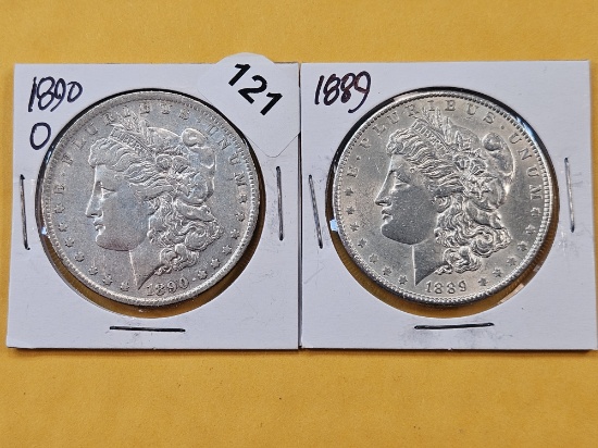 Two About Uncirculated Morgan Silver Dollars